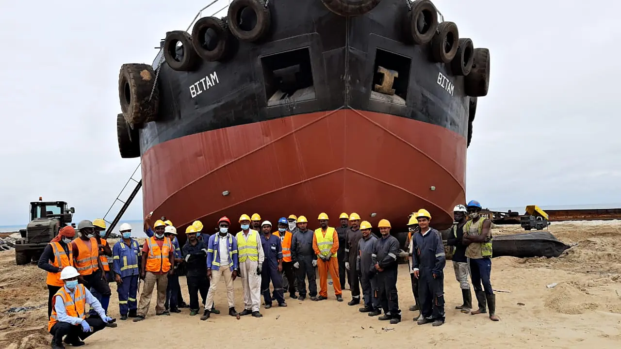 Libraa's yard crew in safety gear in front of BITAM